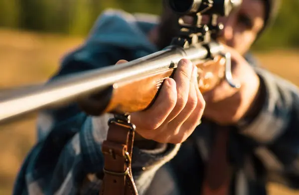 stock image Hunter with shotgun gun on hunt. Barrel of a gun. Track down. Hunting Gear - Hunting Supplies and Equipment