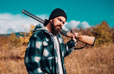 Hunter with shotgun gun on hunt. Gun rifle clipart
