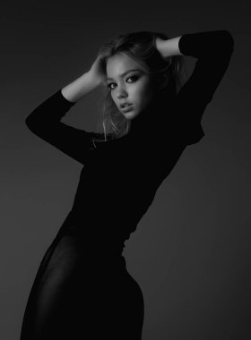 Seductive sexy lovely attractive young sensual woman with perfect slim body posing on studio background. Beautiful elegant sexy model, studio portrait. Sensual beautiful woman face