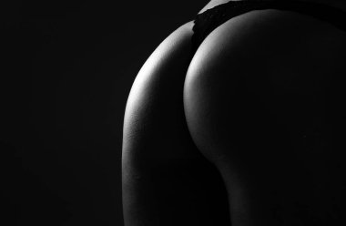 Sexy butt girl in lingerie. Luxury ass. Huge buttocks. Night sexy background. Beautiful ass of sensual girl with clean skin, nice shapes, fit bottom, intimacy. Sexy girl and underwear concept