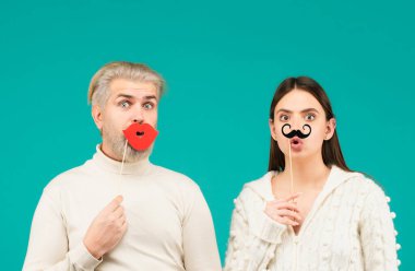 Woman with moustache and man with red lips. Transgender gender identity, equality and human rights. Couple gender equality