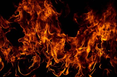 Sancak arka planı için ateş dokusu. Soyut ışıkları yakın. Alev alev yanıyor. Arkaplanı alevler kaplıyor