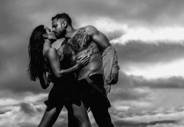 Lovely beautiful couple. Sexy woman and man. Sensual couple hugging, passion and sensual. Seduction flirt of romantic couple. Sexy tender moments. Romantic attractive sensual couple in love hugging