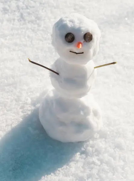 stock image Happy snowman standing in christmas landscape. Merry christmas and happy new year greeting card. Winter fairytale