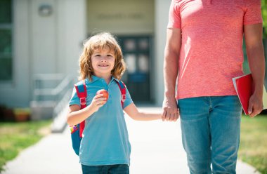 Kid elementary student carrying backpacks holding parent fathers hand walking up educational building. Kid going to primary school. Father walking to School with child clipart