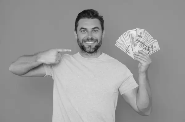 stock image Attractive business man counting money. Handsome middle age man holding 100 dollar banknotes. Successful businessman with money cash. Profit and financial success. Rich man with dollar cash