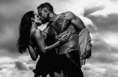 Lovely beautiful couple. Sexy woman and man. Sensual couple hugging, passion and sensual. Seduction flirt of romantic couple. Sexy moments. Romantic attractive sensual couple in love hugging