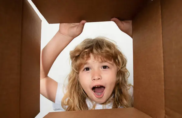 stock image Child open carton delivery box, packaging open and closed cardboard box. Parcels and delivery