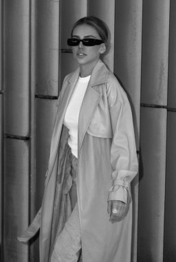 Fashion woman on the street. Trendy coat