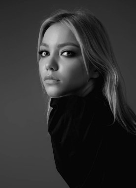 Seductive blonde woman face. Sensual young woman posing with sexy look. Beautiful sexy model. Beauty face. Sensual girl, sexy model portrait. Natural beauty