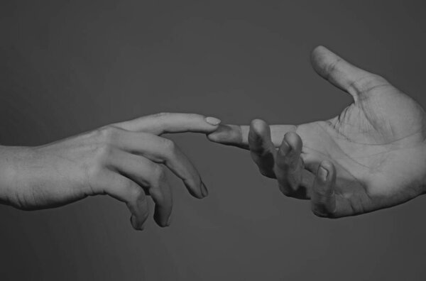 Helping hand. Holding hands, close up. Giving a helping hand. Rescue helping gesture or hands. Salvation relations. Hand reaching out to help, relations. Rescue helping gesture or hands. Support hand