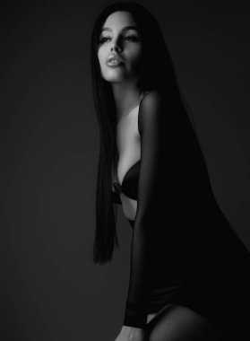 Sexy attractive woman posing with slim sexy body. Beautiful sexy model portrait. Beauty woman face. Attractive sensual girl