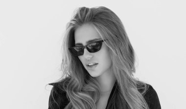 Fashion beauty portrait of young woman with evening stylish makeup and perfect clean skin. Sexy model posing outdoor. Portrait of beautiful young natural woman