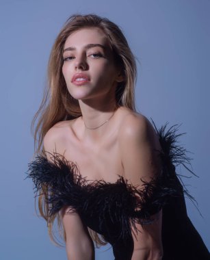 Beautiful sensual young woman in fasion dress. Beautiful model, sexy girl face. Fashion and beauty. Sensual girl with naked sexy body. Natural female beauty and sexy concept