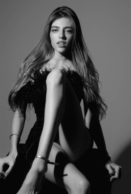 Sexy woman posing with slim sexy body in fashion dress. Beautiful sexy model. Beauty woman face. Attractive sensual girl. Beautiful sexy model portrait. Natural beauty