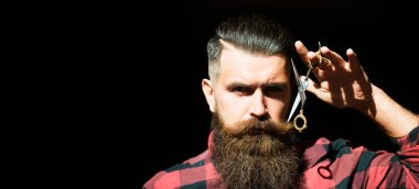 Kuaför makası. Sakallı adam, sakallı erkek. Klasik uzun sakallı şık bir adamın portresi. Berber makası, berber dükkanı. Klasik berber dükkanı. Bıyıklı adamlar. Kuaför bayrağı