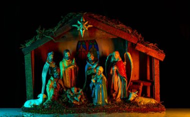 Noel tebrik kartı için mutlu noeller tasarımı. Bebek İsa, Meryem ve Yusuf 'un yemlikte olduğu bir Noel sahnesi. Beytüllahim. Hıristiyan dini