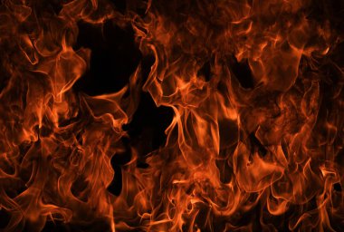 Siyah arka planda yangın alevleri. Ateş, izole edilmiş, soyut bir yapı. Yanan ateşle yanan efekt