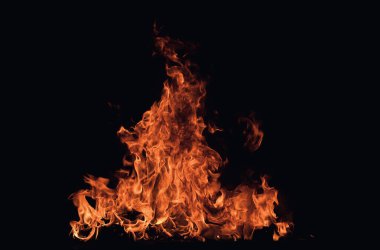 Alevler. Siyah arka planda yanan ışıklar. Siyah arka planda yangın alevleri. Soyut yangın alevi arkaplanı