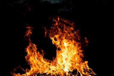 Ateş hareketinin soyut dokusu soyut. Yanan ateş, yanan arka plan