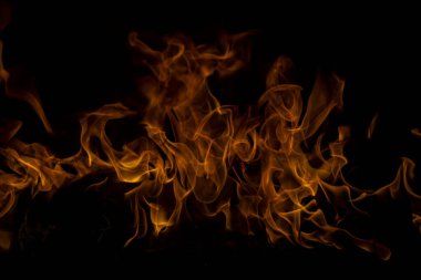 Flame fires. Burn lights on a black background. Fire flames on black background. Abstract fire flame background clipart