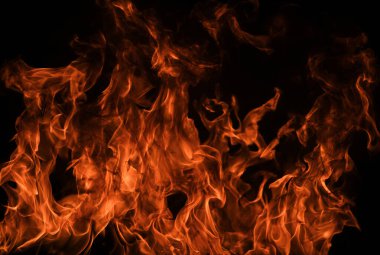 Alevler. Siyah arka planda yanan ışıklar. Siyah arka planda yangın alevleri. Soyut yangın alevi arkaplanı