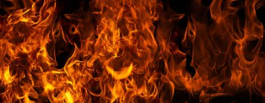 Yangın bayrağı. Yanan Alevler. Canlı renklerle parlayan ateş. Ateşli bir doku. Yüksek çözünürlükte yanan paternler. Kızgın alevler. Yangın arka planı. Yanan alevler. Yanan doku