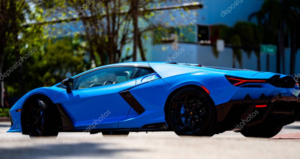 April 3, 2025. Miami. Lambo concept. Lamborghini sportscar on summer. Lamborghini supercar. Lambo design. Lamborghini Huracan sportscar. Supercar Lamborghini closeup. V12 engine. Luxury car