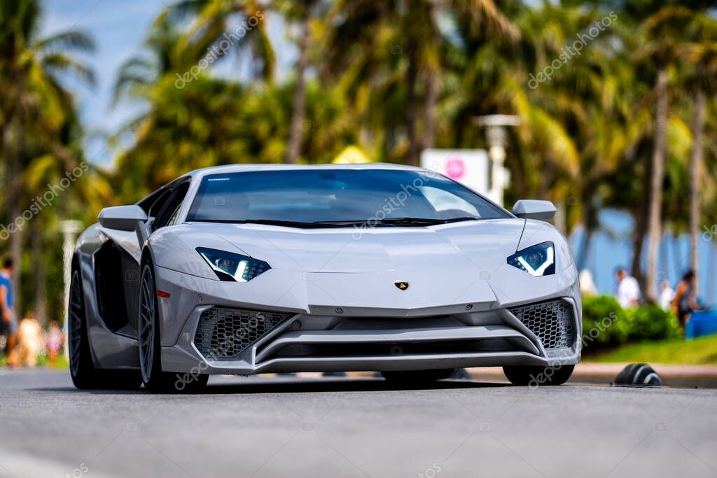 April 3, 2025. Miami. Lambo concept. Lamborghini sport car on the city street. Lamborghini supercar. Lambo design. Lamborghini Huracan sportscar. Supercar Lamborghini closeup. V12 engine. Luxury car
