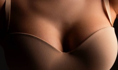 Women with large breasts. Sexy breas, boobs in bra, sensual tits. Beautiful slim female body. Lingerie model. Closeup of sexy female boob in bra