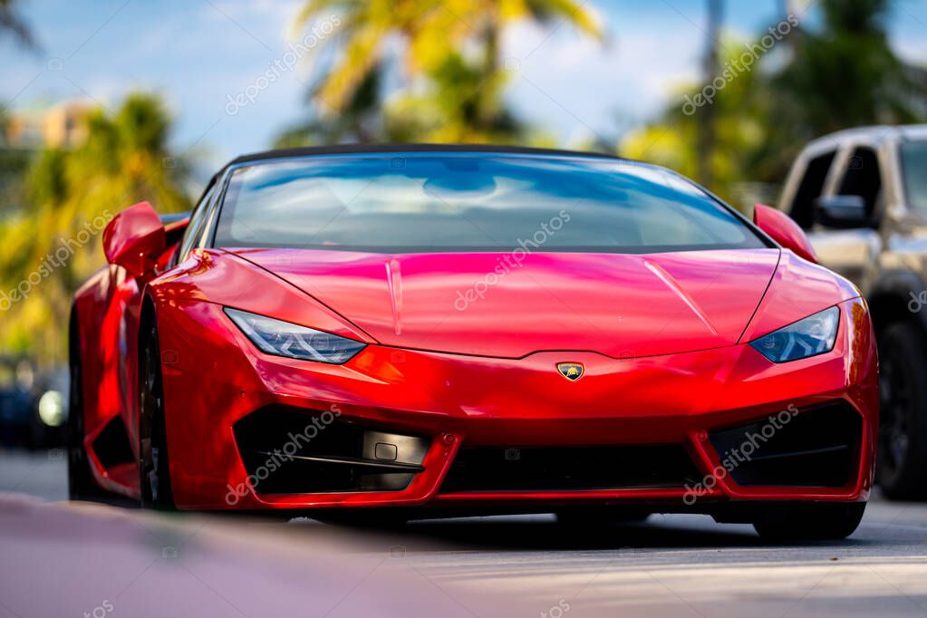 April 3, 2025. Miami. Lambo concept. Lamborghini sportscar on the road. Lamborghini supercar. Lambo design. Lamborghini Huracan sportscar. Supercar Lamborghini closeup. V12 engine. Luxury car