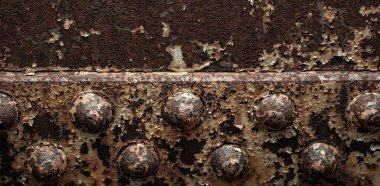 Paslı arka plan dokusu. Metal yüzey. Endüstriyel paslı çelik. Kirli paslı metal. Yaşlanmış metalik arka plan. Lekeli ve oksitlenmiş metal levha. Pas dokusu. Metal korozyon. Yapılandırılmış ve hasarlı demir