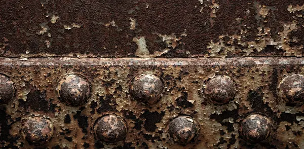 Paslı arka plan dokusu. Metal yüzey. Endüstriyel paslı çelik. Kirli paslı metal. Yaşlanmış metalik arka plan. Lekeli ve oksitlenmiş metal levha. Pas dokusu. Metal korozyon. Yapılandırılmış ve hasarlı demir