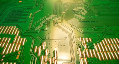 Electronic circuit board closeup. Electronic motherboard card. Circuitry and close-up on electronics. Background of electronics on board electrical circuits, technology texture