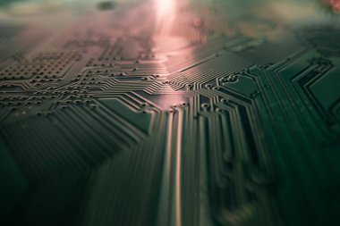 Electronic circuit board with semiconductors chip. Electronic motherboard card. Circuitry and close-up on electronics. Background of electronics on board electrical circuits, technology texture
