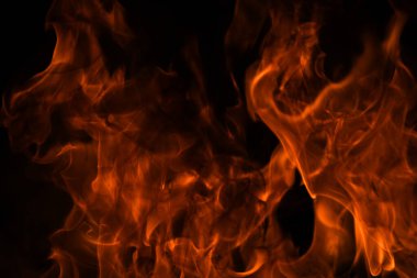 Ateş hareketinin soyut dokusu soyut. Yanan ateş, yanan arka plan