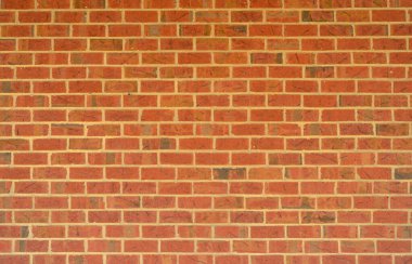 Tuğla duvar, klasik doku. İnşaat temaları için kırmızı tuğla duvar. Tuğla duvar arka planı. Tasarım projeleri için desenli tuğlalar. Sağlam tuğla yapısı. Tuğla duvar deseni