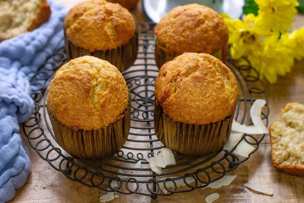 Sweet banana bread muffins with shredded coconut for dessert
