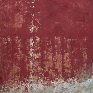 Eski alçılı kırmızı vahşi duvar: kare, kaba boya.