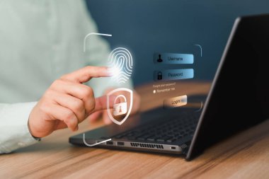 Man login with fingerprint scanning technology in the computer. Secure encryption and access to the user's private information to access the Internet.