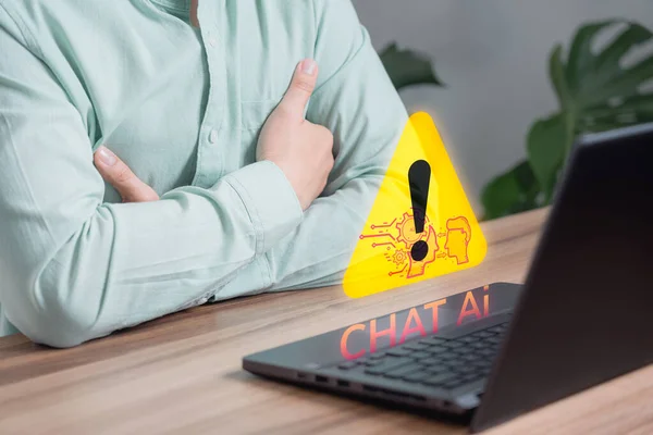 Chat with AI, Artificial Intelligence. Adult man chatting with a smart AI using an artificial intelligence chatbot with triangle caution warning sign for notification error concept.