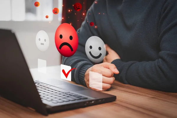 Man client with angry emotion face on virtual screen, bad review, dislike service, assessment low rating, feedback not good. Business service concept of customer testimonial experience dissatisfied.