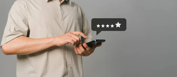 Client give rating to service experience on application by phone. Customer review assessment and testimonial and satisfaction feedback survey. Customer can evaluate quality of service and ranking.