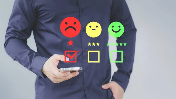 Customer give the feedback with angry emotion face on virtual screen. Assessment testimonial review for dislike service and low quality. Business service concept of customer experience dissatisfied.