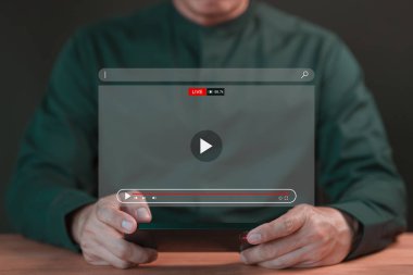 Fans football using a computer laptop for watching live football or soccer streaming online on virtual screen, searching video on internet, concept of sport content online.