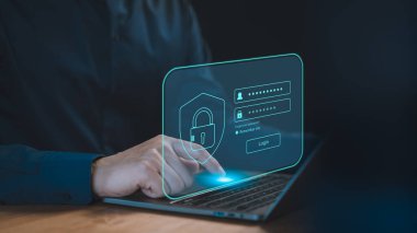 Erkek kullanıcı dizüstü bilgisayar kullanarak kullanıcı adını ve şifresini girin. Kullanıcı gizliliği güvenliği ve kişisel veri internet ağını korumak. Siber güvenlik ve dijital veri koruma teknolojisi kavramı.