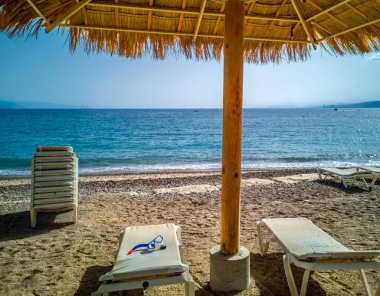 Morning on sandy beach in Eilat - famous tourist resort and recreation city in Israel