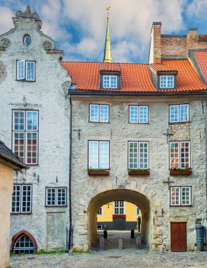 Morning in medieval street in Riga, Latvia, Europe. For tourists, architecture of old Riga town can offer unforgettable unique atmosphere of the Middle Ages and Gothic architecture