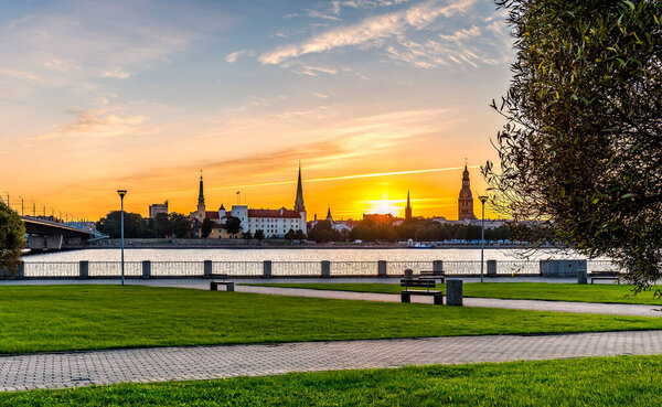 Panoramic image depicting historical district of Riga - the capital city of Latvia, it offers for tourists many resting opportunities and unique medieval and Gothic architecture