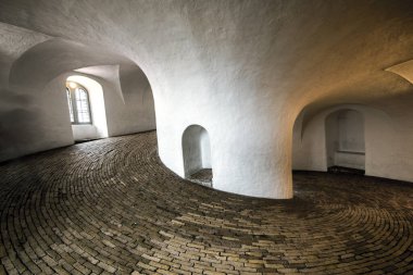 Spiral wide corridor in Round Tower or Rundetaarn in Copenhagen, Denmark. clipart